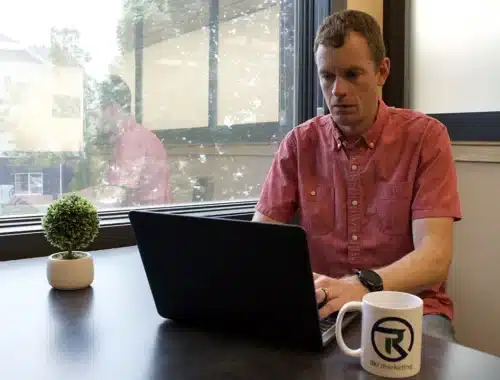 Dan Redford working on marketing strategy at DKR Marketing focused on business growth and strategic planning