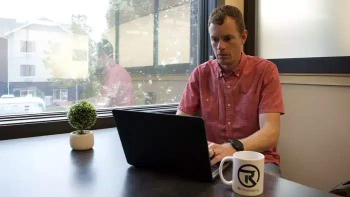 Dan Redford working on marketing strategy at DKR Marketing focused on business growth and strategic planning